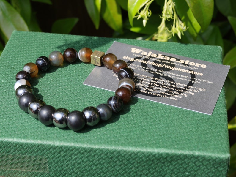 FIT Nature Brown Striped Agate Beads and STRONG Shungite combined with a Wajakaa © Logo bead. keep your energy with yourself