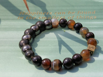 FIT Nature Brown Striped Agate Beads and STRONG Shungite combined with a Wajakaa © Logo bead. keep your energy with yourself