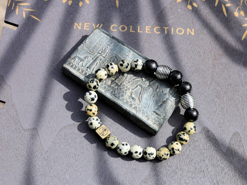 Extramundane Natural Dalmatian Jasper Beads bracelet combined with  grounding and protective stone Shungite. with a Wajakaa © Logo bead.