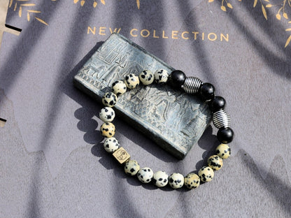 Extramundane Natural Dalmatian Jasper Beads bracelet combined with  grounding and protective stone Shungite. with a Wajakaa © Logo bead.
