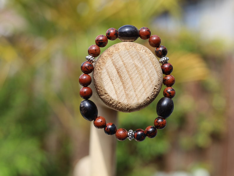 Surprising Natural Mahogany Obsidian bracelet with nice set of handmade Horn Beads. Have better results and more rewarding endeavors