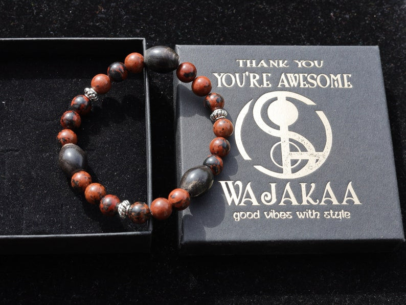 Surprising Natural Mahogany Obsidian bracelet with nice set of handmade Horn Beads. Have better results and more rewarding endeavors