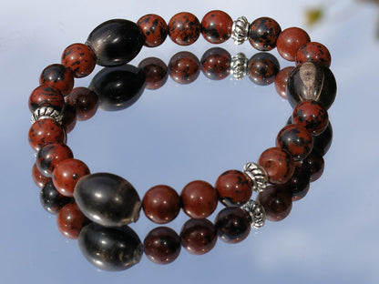 Surprising Natural Mahogany Obsidian bracelet with nice set of handmade Horn Beads. Have better results and more rewarding endeavors