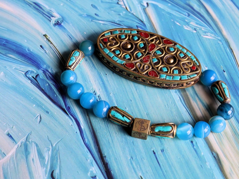 Fascinating Dark Blue Striped Agate Beads bracelet with Handmade Indonesia Bead and Handmade Tibetan Style Beads . Wajakaa © Logo bead.