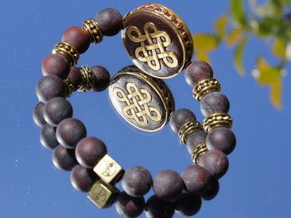 Adventurous Natural Saffron Jasper Beads , High Quality in Matte Round. Combined with Chinese Knot and a Wajakaa © Logo bead.