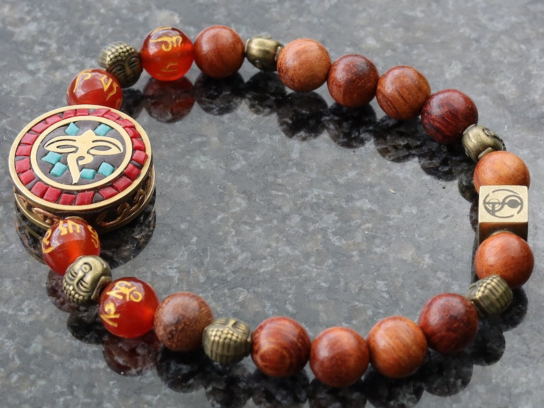 Heavenly Natural Wood Beads with Buddha eyes Bead Combined with Wajakaa © Logo bead and 6 Buddha head, Antique Bronze.