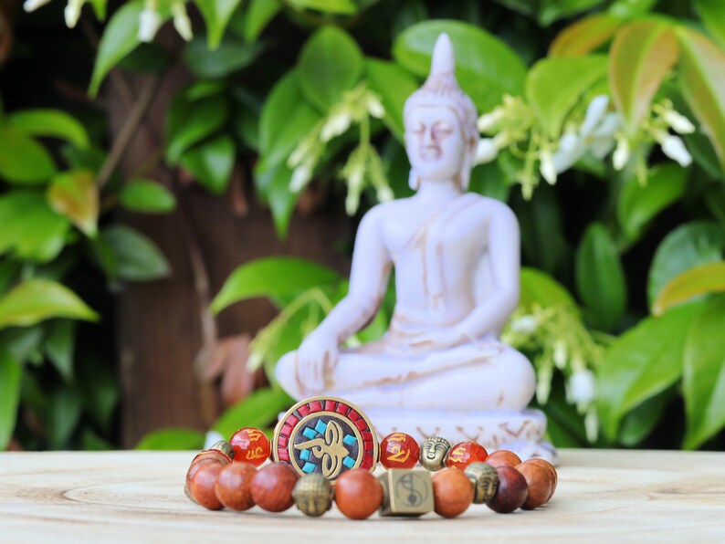 Heavenly Natural Wood Beads with Buddha eyes Bead Combined with Wajakaa © Logo bead and 6 Buddha head, Antique Bronze.