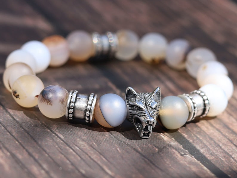 Vet Matte Moss Agate Beads bracelets combined with a Wolf Head. Unique, handmade symbolic jewelry that reflects your style & beliefs.