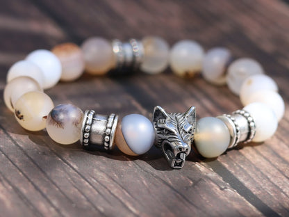 Vet Matte Moss Agate Beads bracelets combined with a Wolf Head. Unique, handmade symbolic jewelry that reflects your style & beliefs.