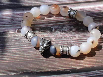 Vet Matte Moss Agate Beads bracelets combined with a Wolf Head. Unique, handmade symbolic jewelry that reflects your style & beliefs.