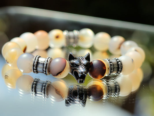 Vet Matte Moss Agate Beads bracelets combined with a Wolf Head. Unique, handmade symbolic jewelry that reflects your style & beliefs.