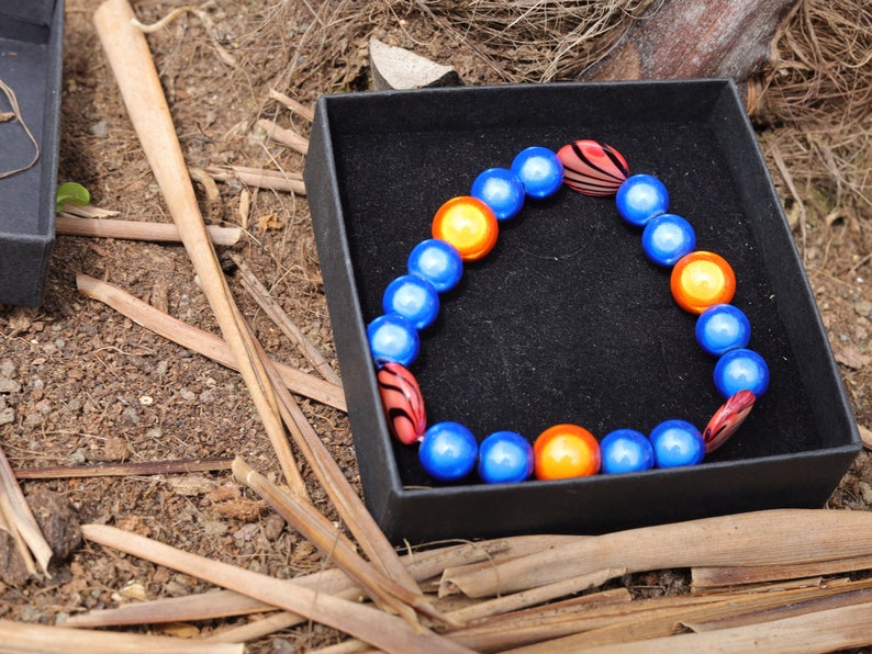 Summer of Love Jewel Collection - 10 mm 3D Miracle beaded bracelet with  Mother of Pearl Shell beads. Exclusive Design Principles.