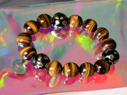 Summer of Love Jewel Collection - 12 mm beaded yellow Tiger eye bracelet with 3x big Handmade Indonesia Bead. Truly inspiring.
