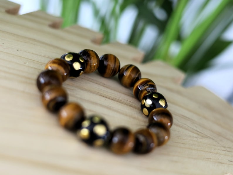 Summer of Love Jewel Collection - 12 mm beaded yellow Tiger eye bracelet with 3x big Handmade Indonesia Bead. Truly inspiring.