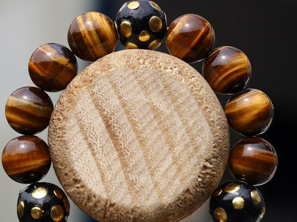Summer of Love Jewel Collection - 12 mm beaded yellow Tiger eye bracelet with 3x big Handmade Indonesia Bead. Truly inspiring.