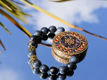 Outstanding Dumortierite bracelet combined with a Handmade big Indonesia Bead. Stimulating brain and brings enhanced intellectual abilities