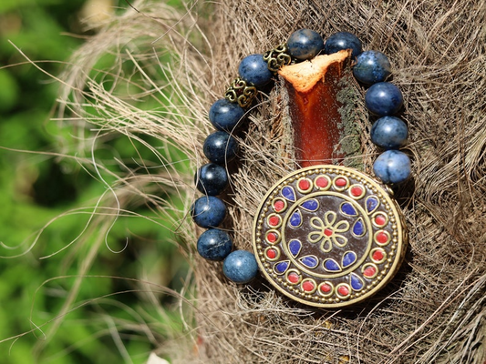 Outstanding Dumortierite bracelet combined with a Handmade big Indonesia Bead. Stimulating brain and brings enhanced intellectual abilities