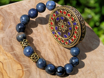 Outstanding Dumortierite bracelet combined with a Handmade big Indonesia Bead. Stimulating brain and brings enhanced intellectual abilities