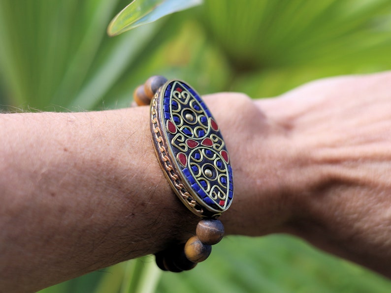 Nifty matte Tiger eye bracelet combined with a Handmade big truly inspiring Indonesia Bead.