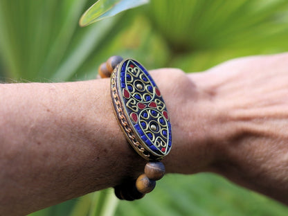 Nifty matte Tiger eye bracelet combined with a Handmade big truly inspiring Indonesia Bead.