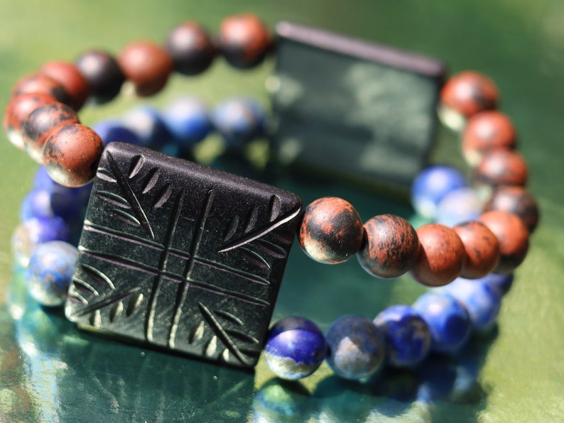 Remarkable beautiful matte Lapis Lazuli and matte Mahogany-Obsidian bracelet. stimulates the desire for knowledge, truth, and understanding