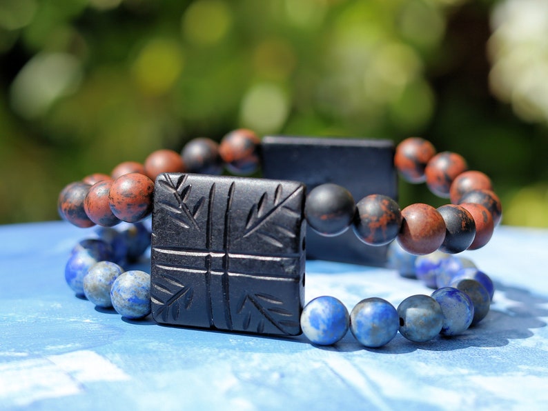 Remarkable beautiful matte Lapis Lazuli and matte Mahogany-Obsidian bracelet. stimulates the desire for knowledge, truth, and understanding