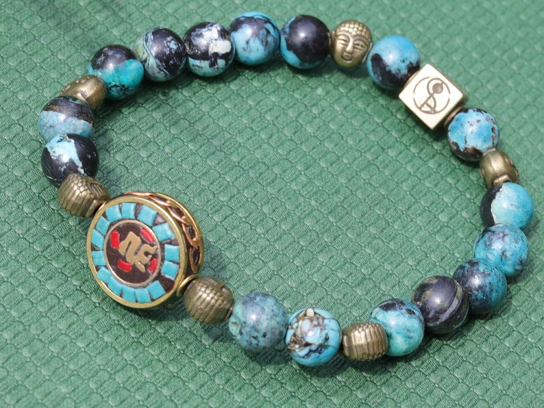 Beaut Turquoise Sea Sediment Jasper Beads bracelet 6 Buddha heads.  The beginning, the middle, the end, the past, the present, the future.