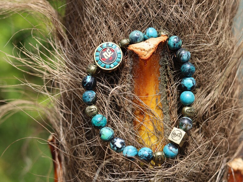 Beaut Turquoise Sea Sediment Jasper Beads bracelet 6 Buddha heads.  The beginning, the middle, the end, the past, the present, the future.