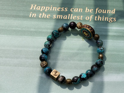 Beaut Turquoise Sea Sediment Jasper Beads bracelet 6 Buddha heads.  The beginning, the middle, the end, the past, the present, the future.