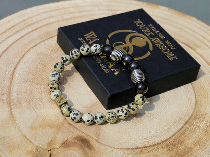 Extramundane Natural Dalmatian Jasper Beads bracelet combined with  grounding and protective stone Shungite. with a Wajakaa © Logo bead.