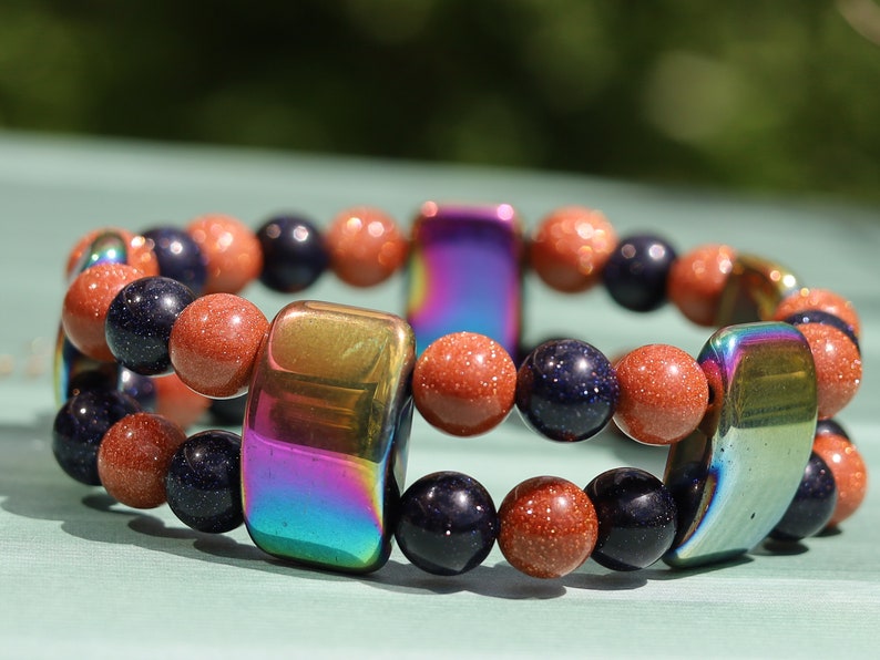Hardy Double row beaded bracelets. Beautiful real Red and dark blue Goldstone with very colorful Holographic Beads.