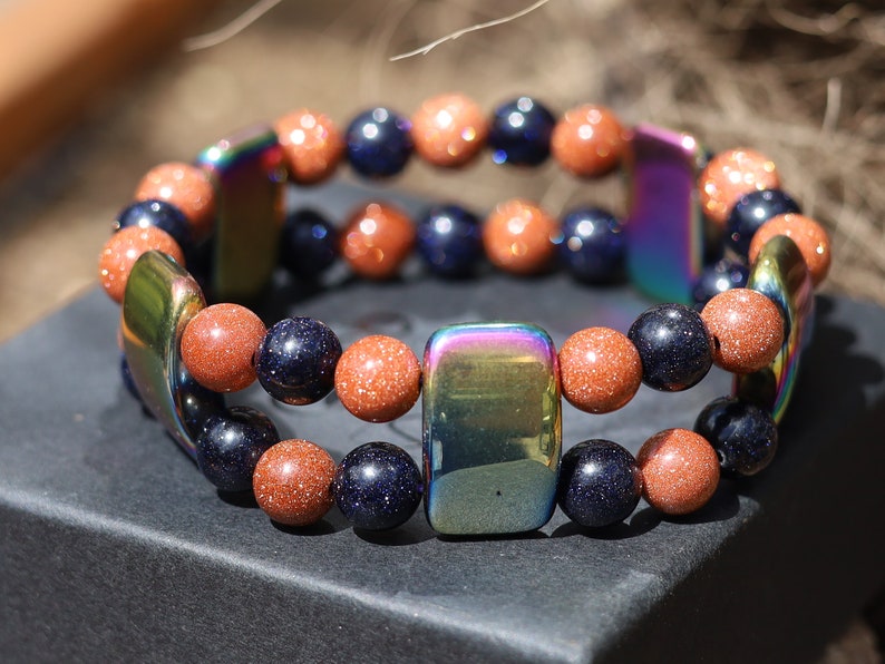 Hardy Double row beaded bracelets. Beautiful real Red and dark blue Goldstone with very colorful Holographic Beads.