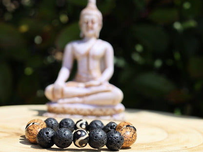 Fervid 12 mm Lava bracelet with beautiful Undyed & Natural Bodhi Beads. Combined with Om Mani Padme Hum beads. The jewel is in the lotus