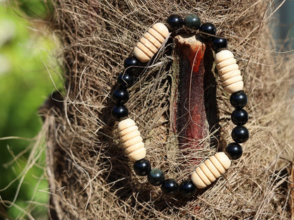 Easy going Natural Obsidian Grade AA, with Turned wooden beads. Symbolically, wood has a strong connection with the Earth and nature.