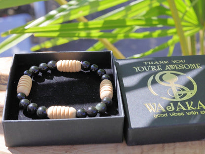 Easy going Natural Obsidian Grade AA, with Turned wooden beads. Symbolically, wood has a strong connection with the Earth and nature.