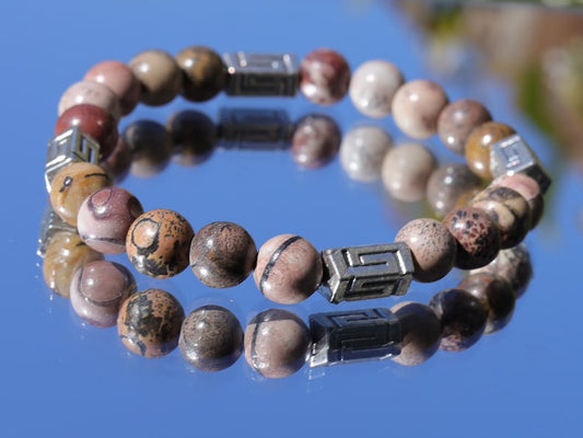 Visible Rhodonite Beaded bracelet with Antique Silver Tone Spacer Beads Pentagon. your emotions to the point of clarity and refinement