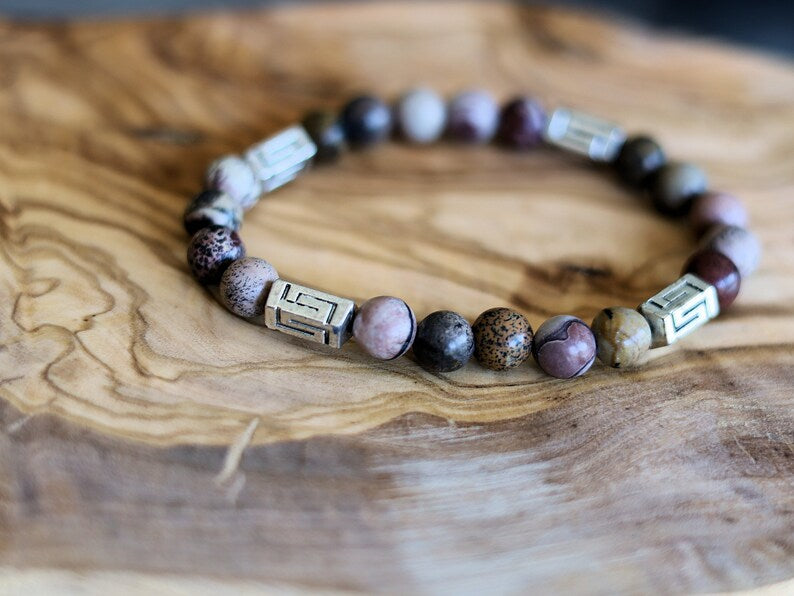 Visible Rhodonite Beaded bracelet with Antique Silver Tone Spacer Beads Pentagon. your emotions to the point of clarity and refinement