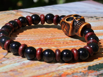 Disturbing  Obsidian Grade AA, with  wooden spacer beads. Symbolically, wood has a strong connection with the Earth and nature.