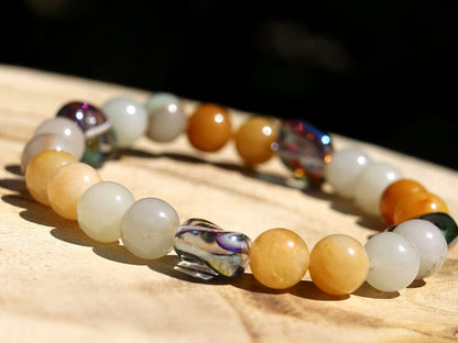 Attracting combination bracelet with Blue Natural Old Topaz Jade and green Myanmar Jade/Burmese Jade.  re-motivates and aligns the meridians