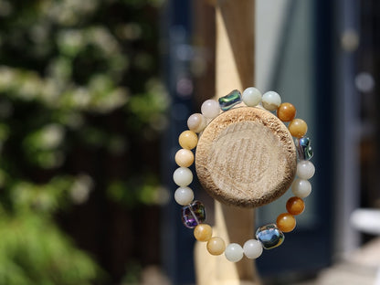 Attracting combination bracelet with Blue Natural Old Topaz Jade and green Myanmar Jade/Burmese Jade.  re-motivates and aligns the meridians