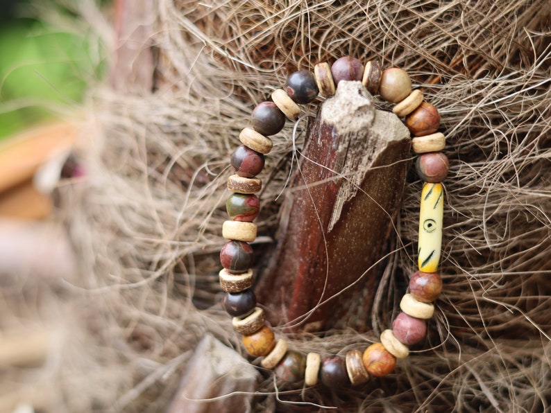 Rare Natural Picasso Stone/Picasso Jasper Bead bracelet combined with beautiful Disc coconut and  fantastic handmade bone bead from Africa.