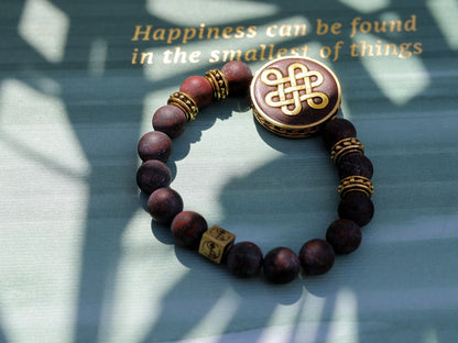 Adventurous Natural Saffron Jasper Beads , High Quality in Matte Round. Combined with Chinese Knot and a Wajakaa © Logo bead.