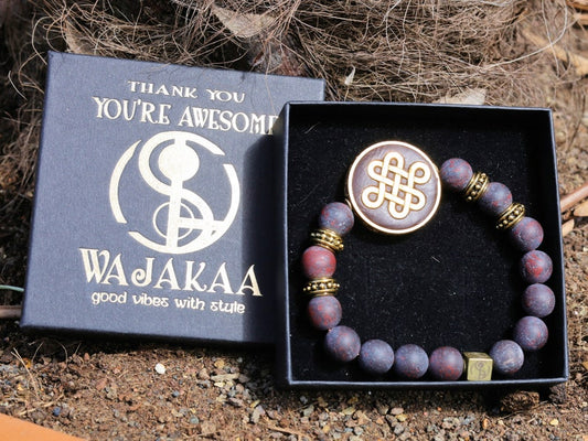 Adventurous Natural Saffron Jasper Beads , High Quality in Matte Round. Combined with Chinese Knot and a Wajakaa © Logo bead.