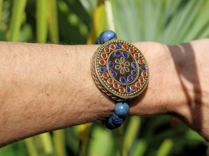 Outstanding Dumortierite bracelet combined with a Handmade big Indonesia Bead. Stimulating brain and brings enhanced intellectual abilities