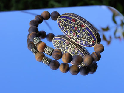 Nifty matte Tiger eye bracelet combined with a Handmade big truly inspiring Indonesia Bead.