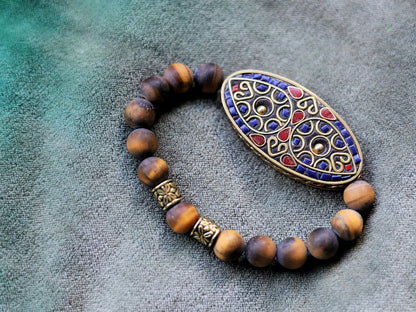 Nifty matte Tiger eye bracelet combined with a Handmade big truly inspiring Indonesia Bead.