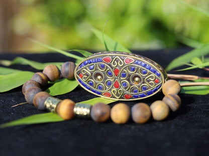 Nifty matte Tiger eye bracelet combined with a Handmade big truly inspiring Indonesia Bead.