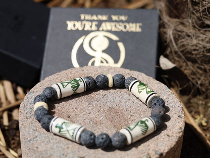 Legendary Thunderbird bead with grey Lava stones bracelet. It is considered a supernatural being of power and strength.
