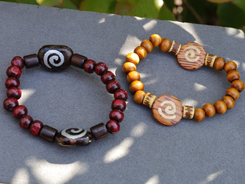 Wooden collection - 2x BRACELETS Cherry Red/ brown roundel 8x7mm Natural Wood with Wooden spiral beads.  mysterious symbol of space