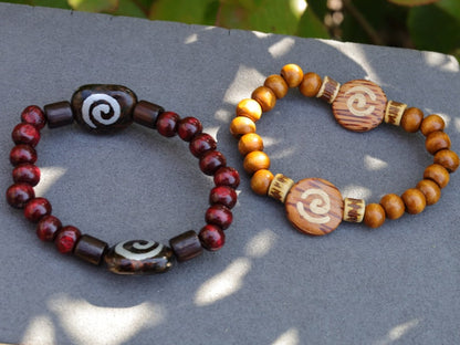 Wooden collection - 2x BRACELETS Cherry Red/ brown roundel 8x7mm Natural Wood with Wooden spiral beads.  mysterious symbol of space